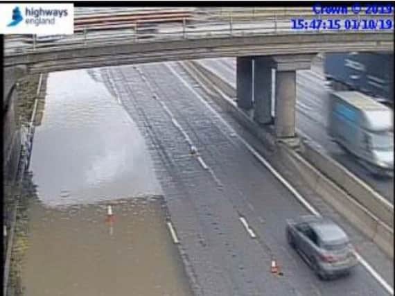 Flooding on the M1 northbound near junction 16 for Daventry. Photo: Motorway Cameras