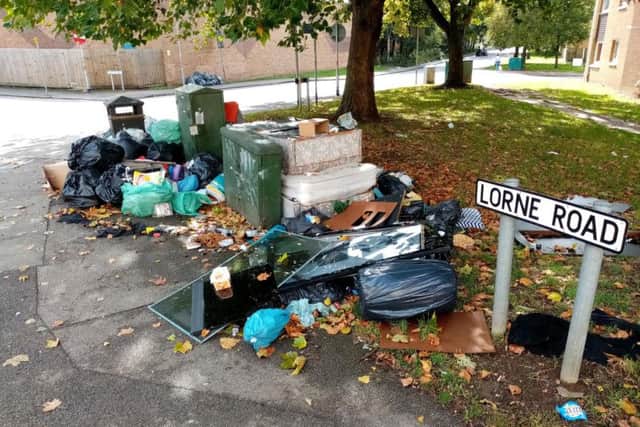 There are street corners and curbs across the town that become overwhelmed with fly-tipping every week - like this corner in Lorne Road.