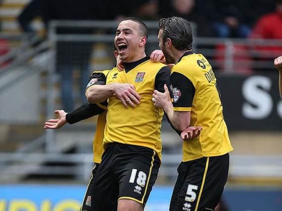 Rod McDonald celebrates scoring his goal in the Cobblers' 4-0 win at Leyton Orient in February, 2016 (Picture: Pete Norton)