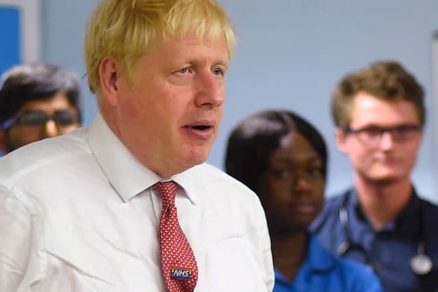 Boris Johnson at a hospital in Watford where he spoke about the Harry Dunn case. Photo: Getty Images