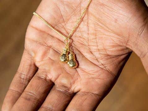 Over 100 of the gold plated boxing glove pendants have already been sold.