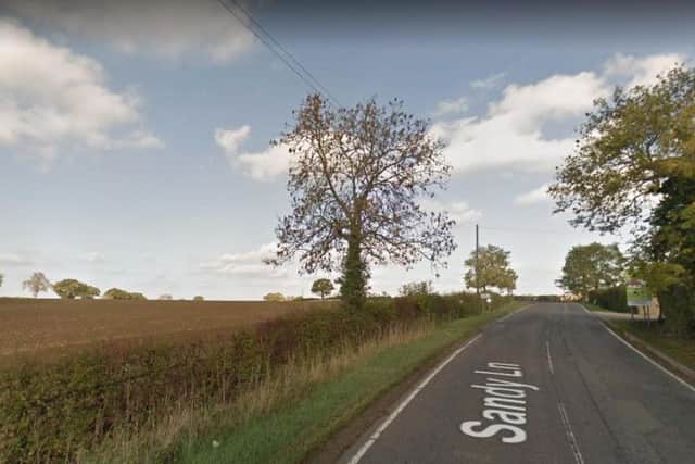 The crash happened near the garden centre on Sandy Lane.