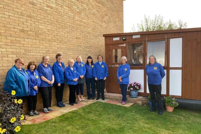 Cats Protection Northampton volunteers came together to celebrate the opening of the new pen