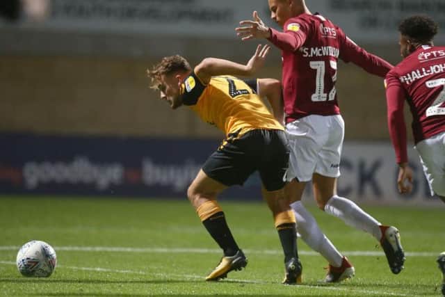 Shaun McWilliams fights for possession at the Abbey Stadium