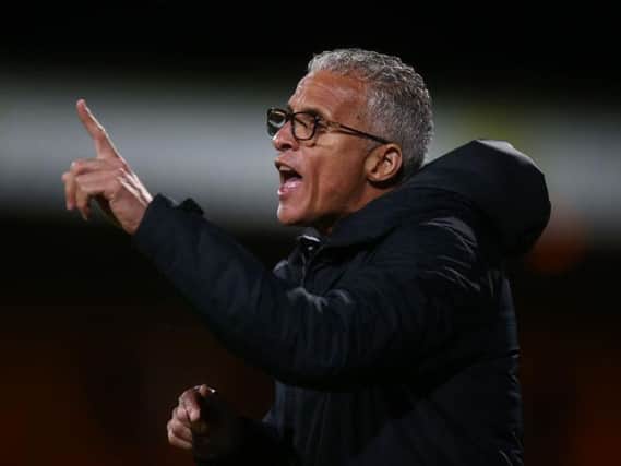 Keith Curle shouts instructions from the touchline during the Cobblers' 1-0 Leasing.com Trophy win at Cambridge United on Tuesday (Picture: Pete Norton)