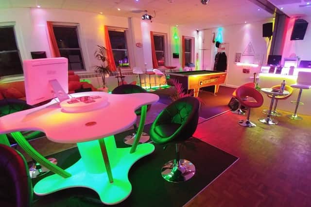 Janan turned his former building into a sensory experience for his members to relax and lean their music. This was the lounge area.