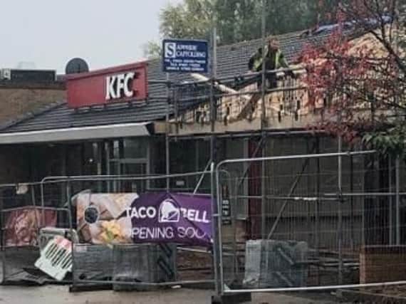 Building work has begun once again at Taco Bell with signs saying it is 'opening soon'