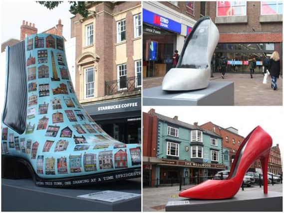 Three giant shoes in Northampton town centre have been taken away because of vandalism...