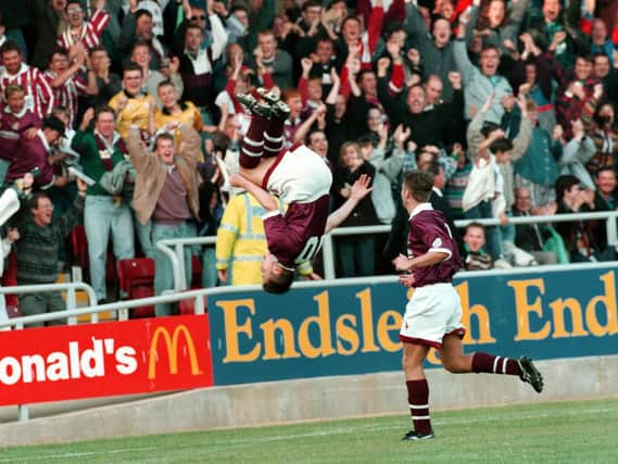 Martin Aldridge celebrates with a spectacular somersault after scoring the first Cobblers goal at Sixfields, in a 1-1 draw with Barnet, on October 15, 1994 (Pictures: Pete Norton)