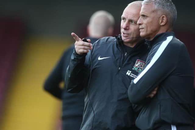 Keith Curle with David Kelly. Picture: Pete Norton
