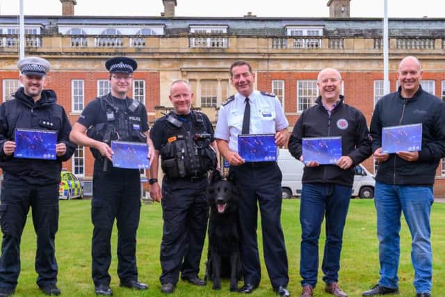 A fundraising calendar showing Northamptonshire Police's canine crimefighters in action is now on sale.