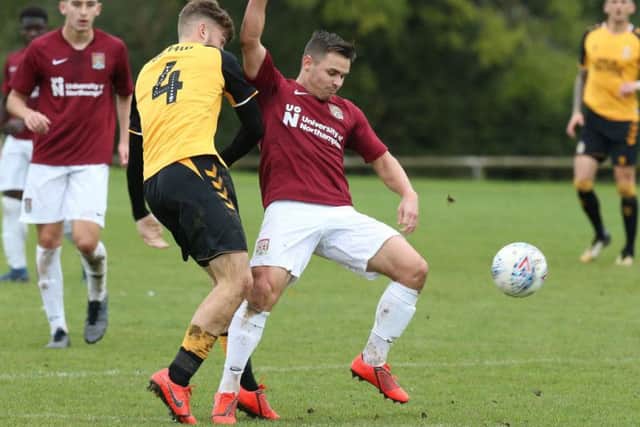 Birthday boy and hat-trick hero Billy Waters in action against Cambridge on Tuesday. Picture: Pete Norton