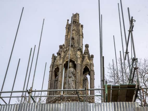 Scaffolding on the Hardingstone Eleanor Cross as repairs began in April