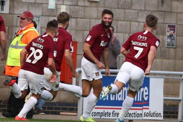 Jordan Turnbull celebrates making it 2-0. Pictures: Pete Norton