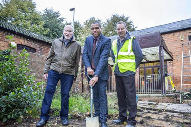 Chair of Rectory Farm Residents' Association Toby Birch, borough councillor for Rectory Farm James Hill and construction director for Goodfellow Stuart Johnson on site at the community centre.