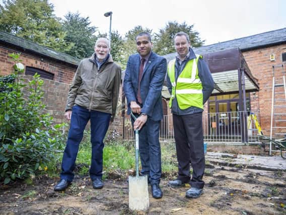 Chair of Rectory Farm Residents' Association Toby Birch, borough councillor for Rectory Farm James Hill and construction director for Goodfellow Stuart Johnson on site at the community centre.