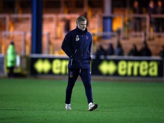 Under-fire: Steven Pressley cuts a disconsolate figure after his side's loss to Northampton on Tuesday. Picture: Pete Norton