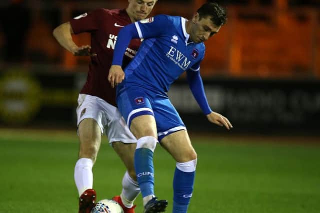 Scott Wharton makes a tackle