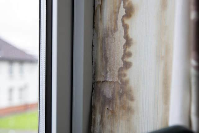 Water has been coming in John's bedroom now for years. He said he's had to move furniture around to avoid getting his bed wet. Pictures by Kirsty Edmonds.