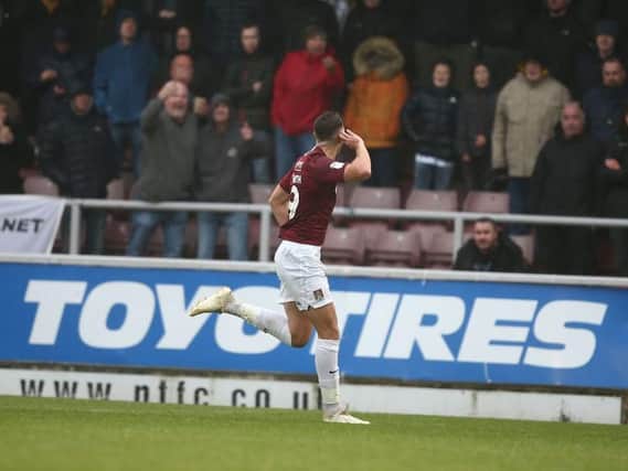 Harry Smith celebrates after firing the Cobblers ahead against Cambridge United (Picture: Pete Norton)