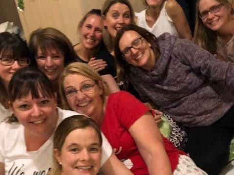 The pre-school staff (pictured at their sleepover) have raised nearly 2,000 for a pooly little boy and his family to take a trip away.