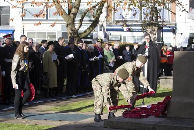Two young cadets lay wreaths in Northampton town centre at 2017's Remembrance service.