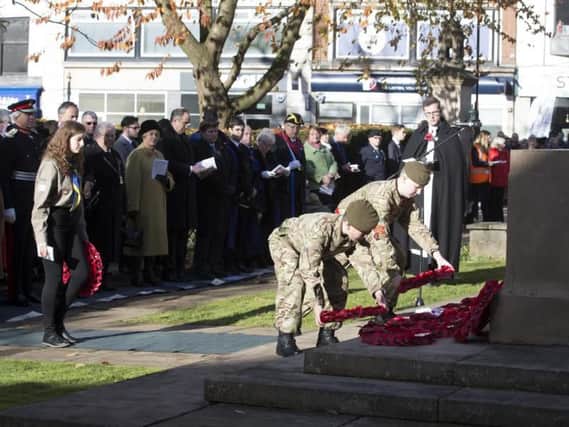 Two young cadets lay wreaths in Northampton town centre at 2017's Remembrance service.
