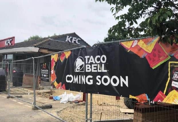 'Coming soon' signs were put up on the fencing surrounding the new Taco Bell site in July.