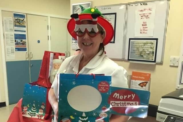 Jane Drew of the Brampton Ward pictured last year spreading some Christmas cheer to NGH wards.