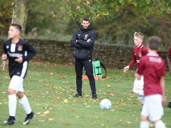 Marc Richards oversees a Cobblers youth training session at Moulton College (Pictures: Pete Norton)
