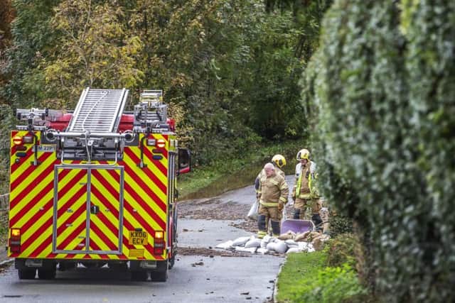 Five Northamptonshire Fire and Rescue Service vehicles were on site from 6.30am on Friday morning dealing with the burst water pipe. Pictures by Kirsty Edmonds.