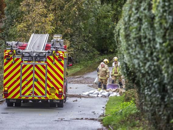 Five Northamptonshire Fire and Rescue Service vehicles were on site from 6.30am on Friday morning dealing with the burst water pipe. Pictures by Kirsty Edmonds.