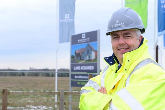 John Dillon at the new DWH Overstone site cutting the sod