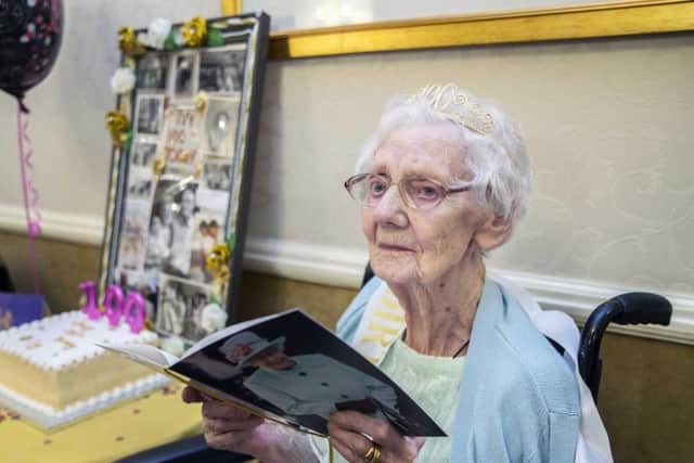 Ivy Dunkley opened her card from the Queen at Templemore Care Home yesterday surrounded by her family and friends.