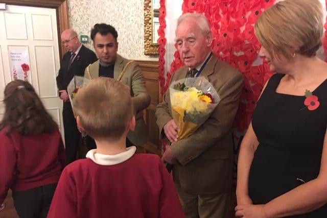 A Remembrance Day service at Templemore Care Home gave Northampton children the chance to learn first-hand about WWII.