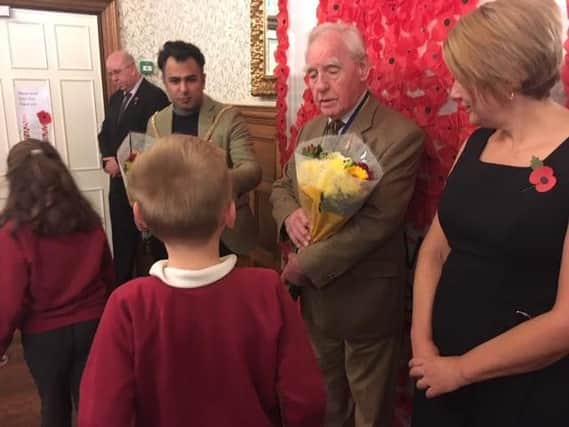 A Remembrance Day service at Templemore Care Home gave Northampton children the chance to learn first-hand about WWII.