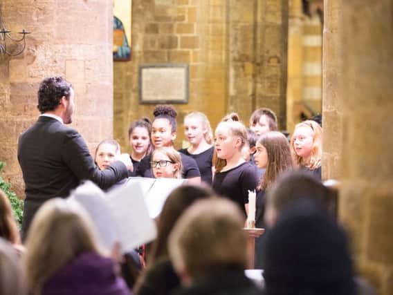 The Training Choir from the Northamptonshire Music and Performance Arts Trust at the World Day of Remembrance service in 2018