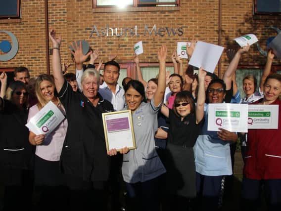 Staff at Ashurst Mews Care Home in Moulton celebrate the 'outstanding' rating from the CQC