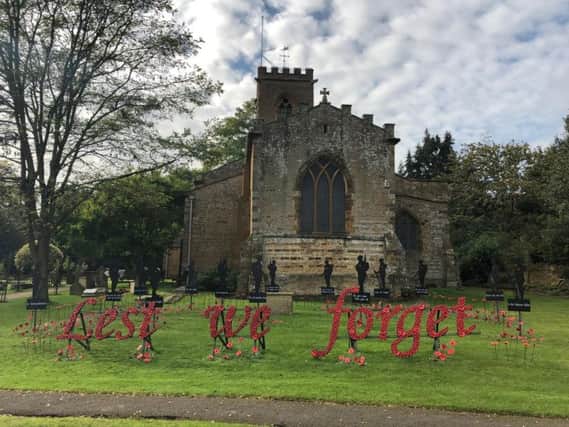 The poppy display at St Peter and St Paul's Church, Abington