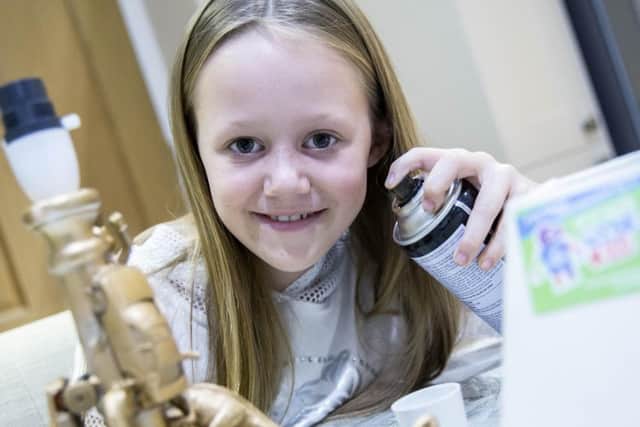 Mimi Pilcher is upcycling a lamp - just one way of reducing waste