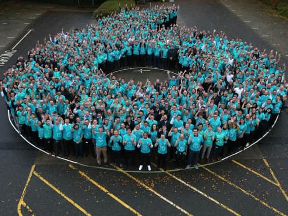 Mercedes staff at the Brixworth factory form a six to celebrate the sixth consecutive double F1 title. Photo: Mercedes-AMG Petronas Motorsport