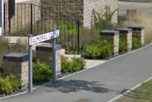 A road rage incident in Balmoral Close allegedly ended in a driver swinging an axe at a man's head.