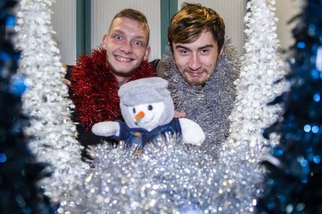 Kris Lewis and Jayson Farmer who access the Hope Centre's day centre are helping to kick-start the Chron and Hope Centre's Christmas present appeal. Picture by Kirsty Edmonds.