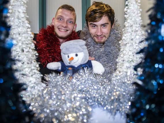 Kris Lewis and Jayson Farmer who access the Hope Centre's day centre are helping to kick-start the Chron and Hope Centre's Christmas present appeal. Picture by Kirsty Edmonds.