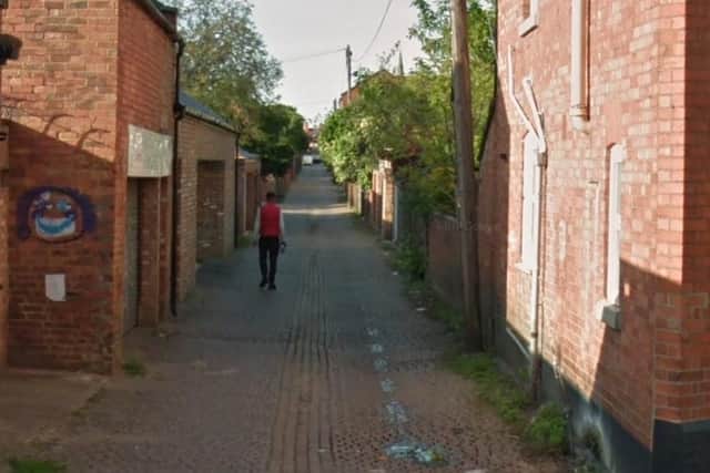 A six-foot red brick wall in a Northampton neighbourhood collapsed outwards into an alleyway.