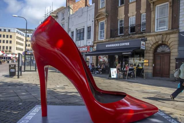 The red stiletto, now at the top of Abington Street, caught many residents' eyes when it appeared in the summer. Picture by Kirsty Edmonds.