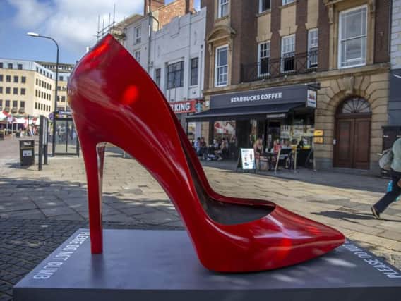 The red stiletto, now at the top of Abington Street, caught many residents' eyes when it appeared in the summer. Picture by Kirsty Edmonds.