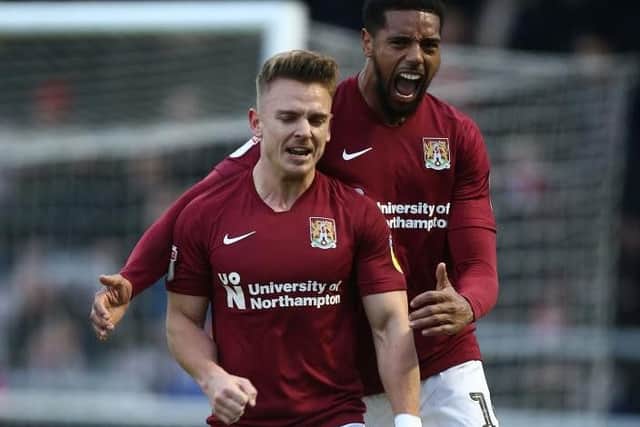 Sam Hoskins squeezed home his penalty to put Cobblers 3-0 in front. Picture: Pete Norton