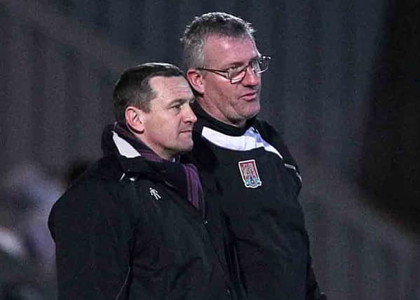 NOT THIS TIME - Cobblers boss Aidy Boothroyd, pictured here with goalkeeping coach Tim Flowers, lost out to Gary Rowett in the manager of the month award for February