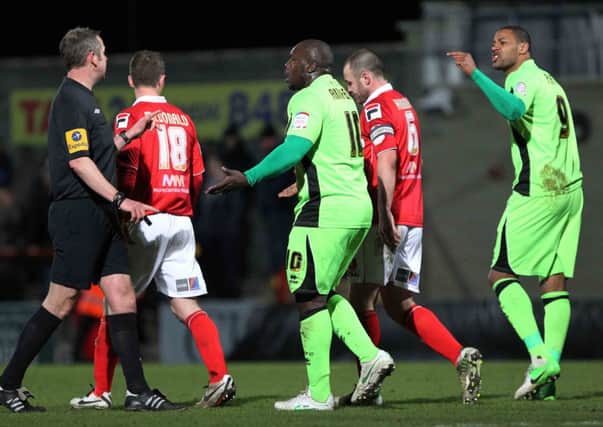 OFF THE BENCH - Cobblers strikers Adebayo Akinfenwa and Clive Platt added strength and power to the attack late on at Morecambe (Picture: Sharon Lucey)